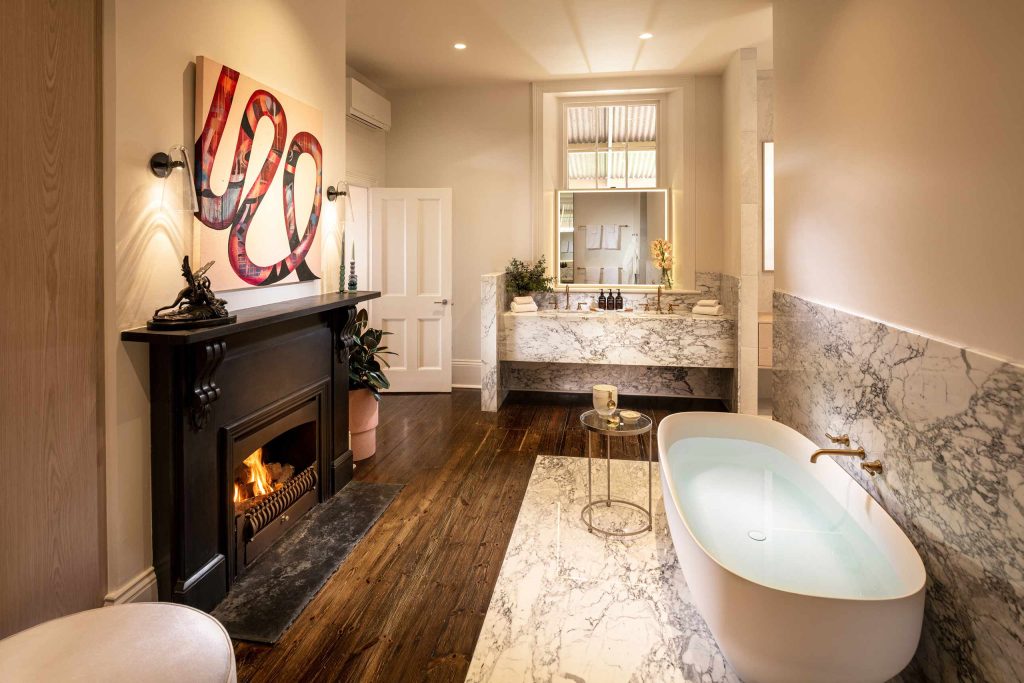 An inviting bathroom with a fireplace at Kingsford The Barossa, Barossa Valley, Australia