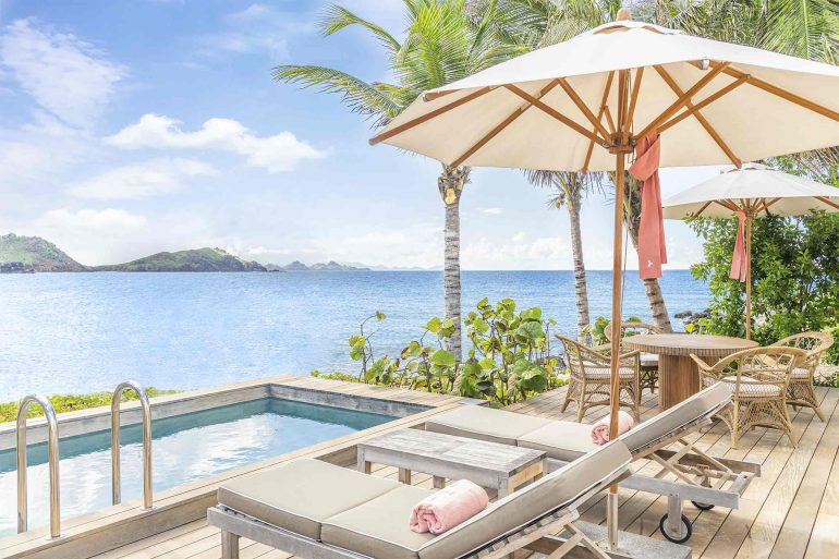 Loungers with a view over the Caribbean Sea at the Cheval Blanc St-Barth, Isle de France, St. Barts
