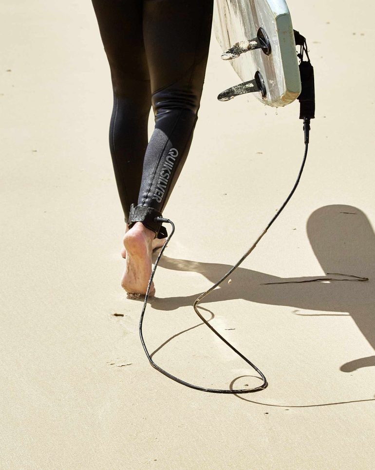 Model Nathan McGuire walk down a beach in South Australia, South Australia menswear editorial, Australia