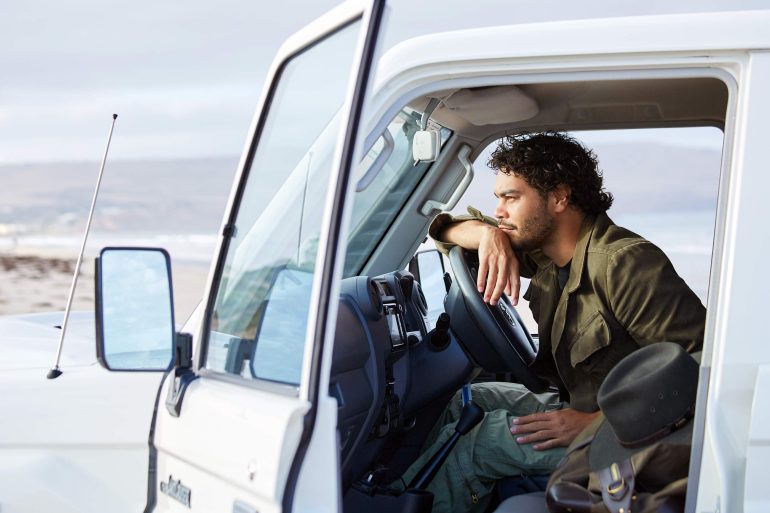 Model Nathan McGuire drives a Toyota Landcruiser, South Australia menswear editorial, Australia