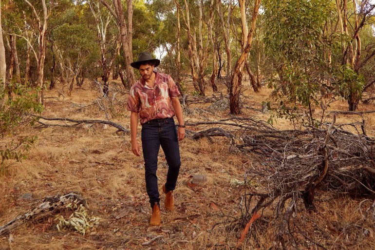 Model Nathan McGuire walking through the woods, South Australia menswear editorial, Australia