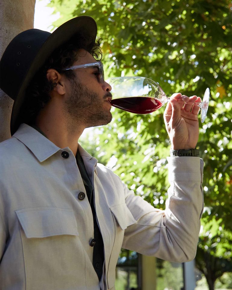 Model Nathan McGuire enjoys a glass of wine, South Australia menswear editorial, Australia