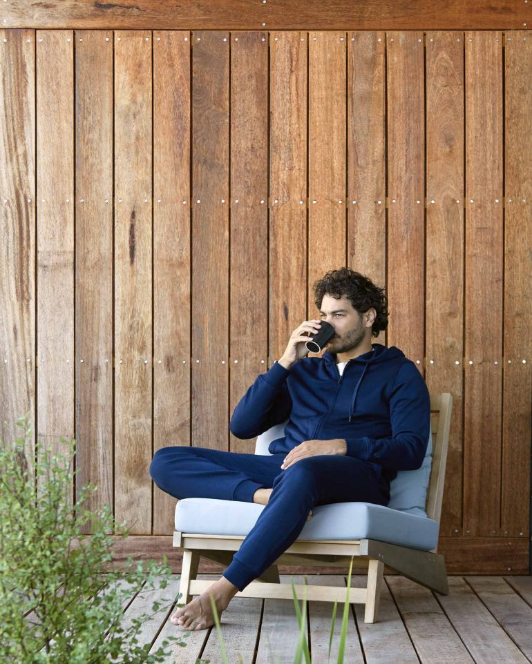 Model Nathan McGuire enjoys a cup of coffee, South Australia menswear editorial, Australia