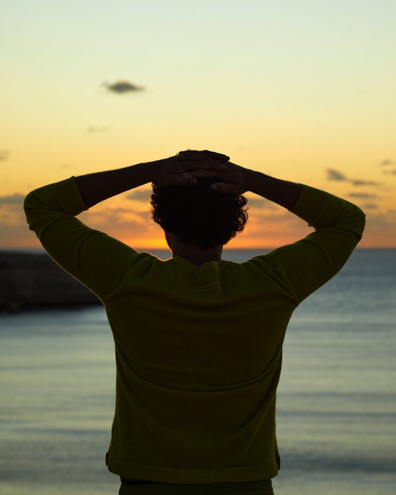 Model Nathan McGuire at the beach during sunset, South Australia menswear editorial, Australia