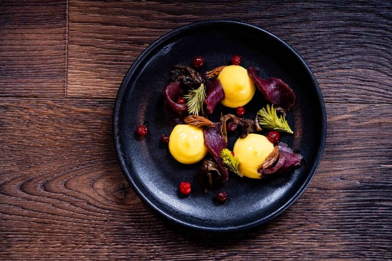 A meal is served at Niehku Mountain Villa, Riksgränsen, Sweden