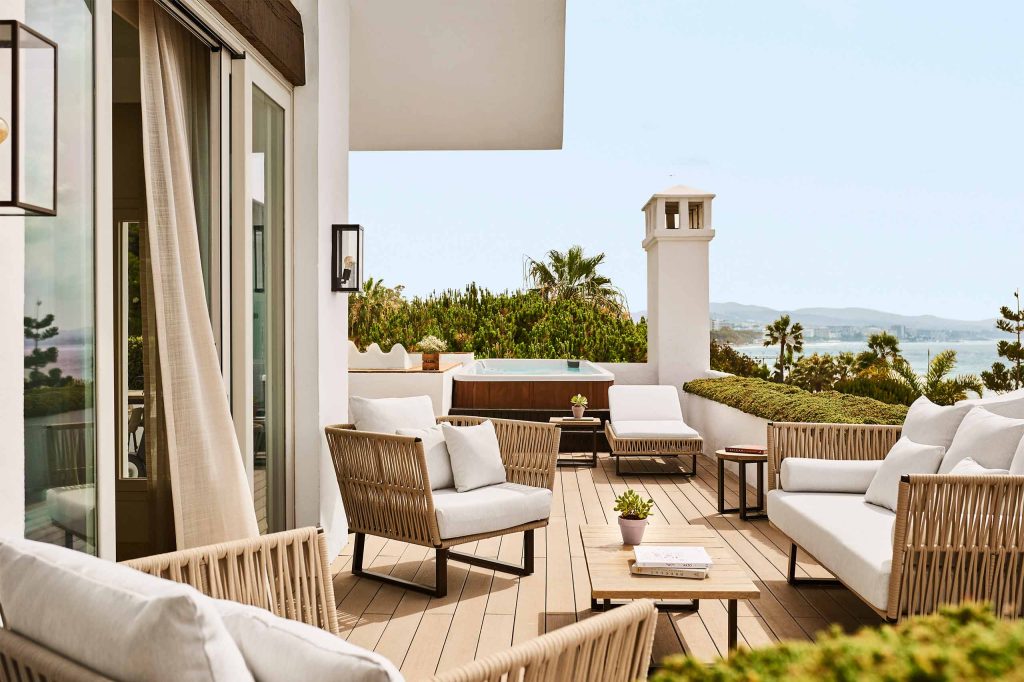An outdoor terrace at Puente Romano Beach Resort, Marbella, Spain