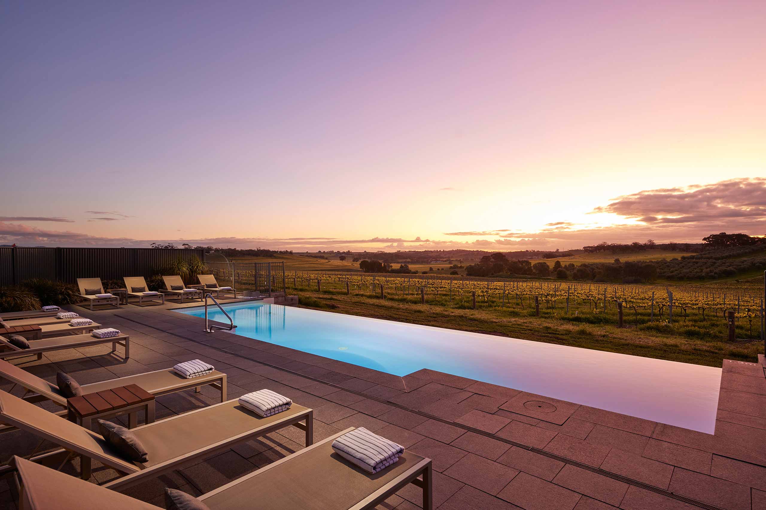 Sublime outdoor pool captured at sunset at The Louise, Barossa Valley, Australia