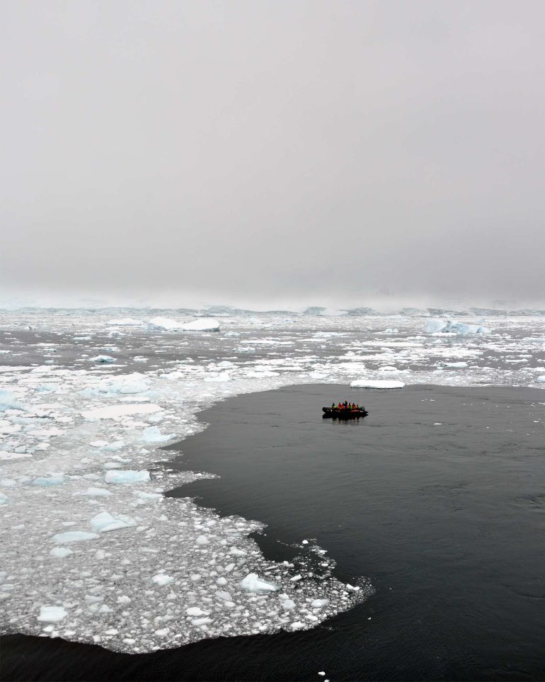 A sole zodiac boat in Antarctica