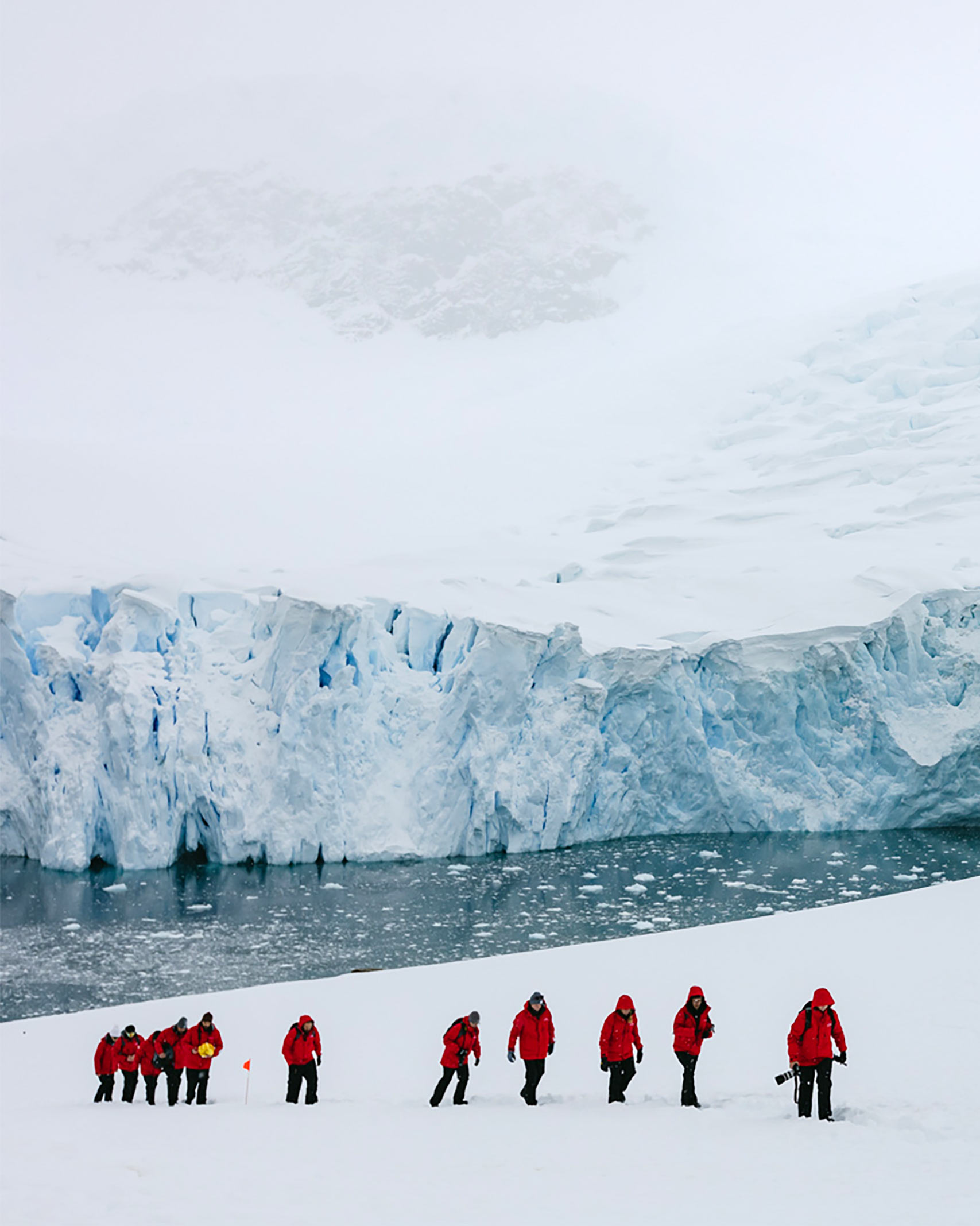 A group of expeditionists in Antartica