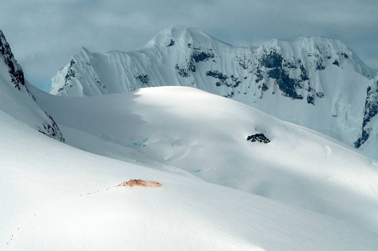 View over the snowed in hills of Antarctica