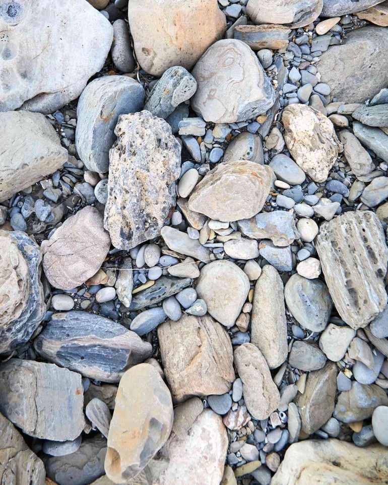 Differently shaped stones in Myponga Beach, Australia