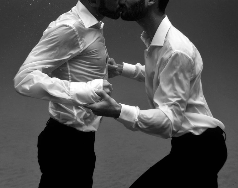 Two men kiss underwater, artwork by Kris Micallef, EuroPride Valletta 2023, Malta