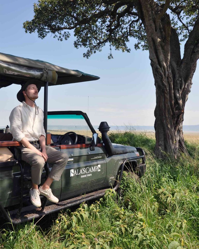 Steffen Michels on the lookout for pangolins while staying at Sala's Camp in the Masai Mara National Reserve, Kenya