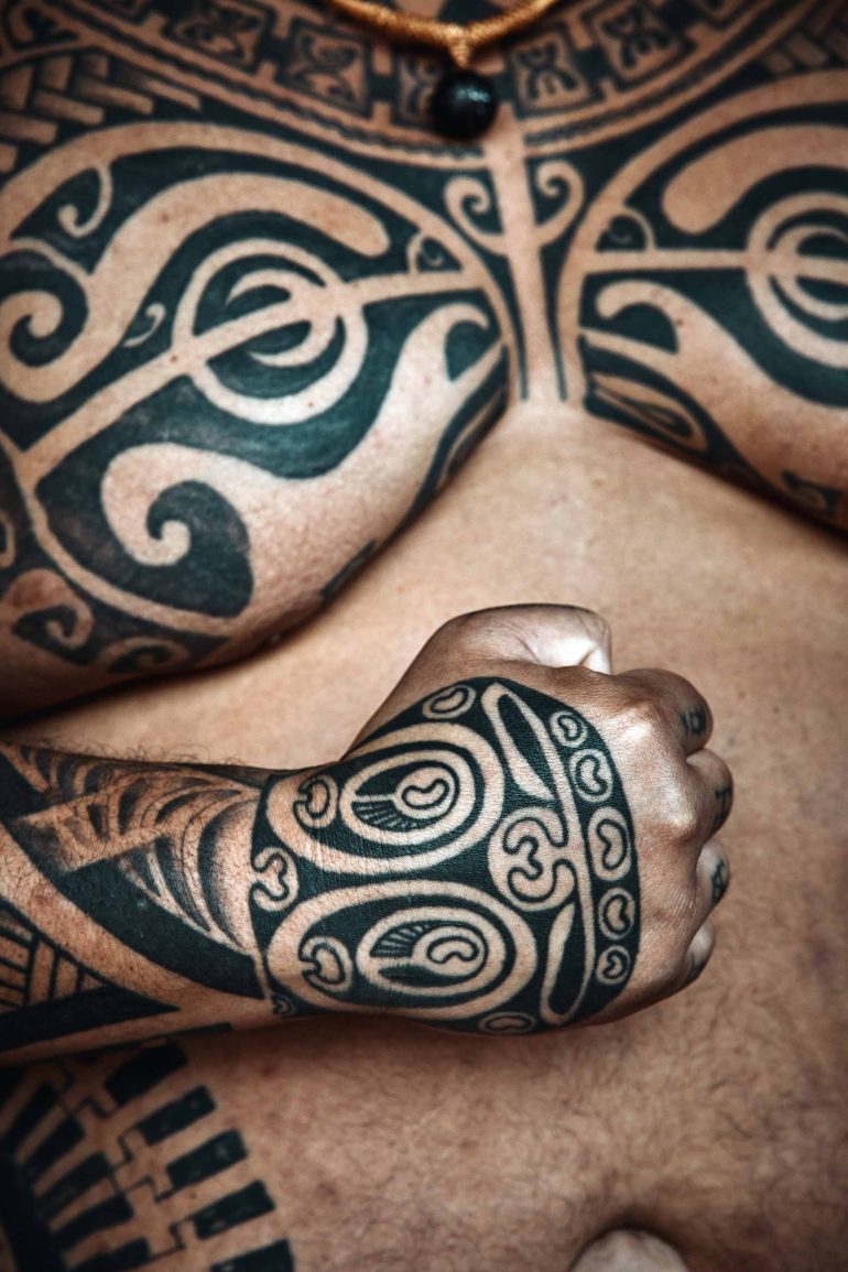 Close-up of traditional tattoos in The Islands of Tahiti, French Polynesia