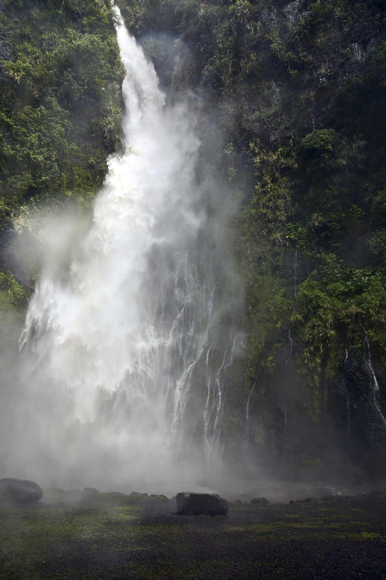 An impressive waterfall in The Islands of Tahiti, French Polynesia