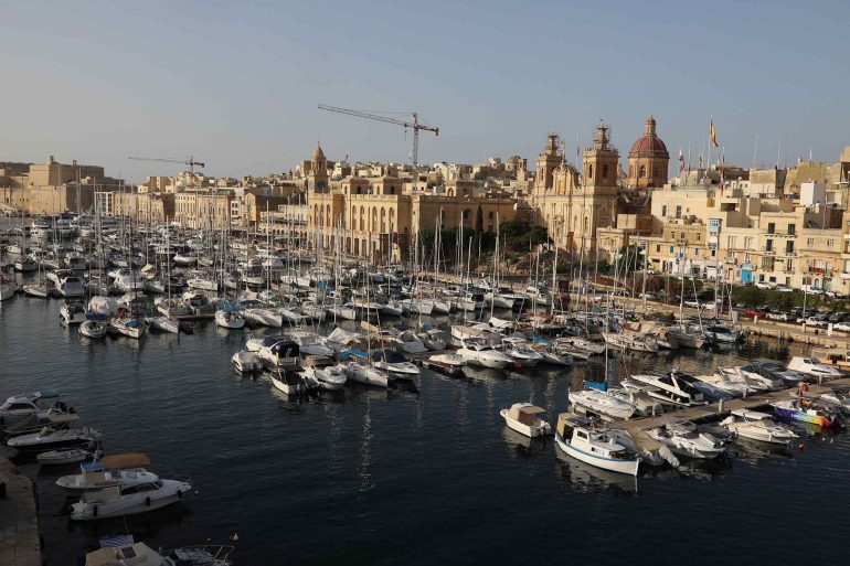 Boats anchored at a harbour in Malta