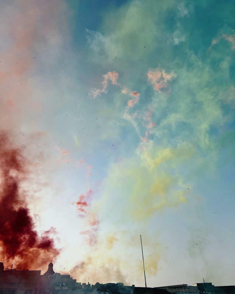 Coloured smoke paints the air in Malta as the city celebrates