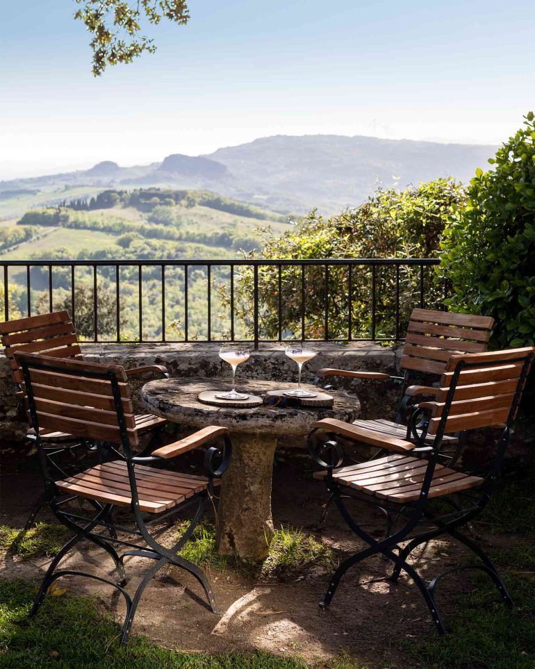 Cocktails are served with a view over the Tuscan countryside, Italy