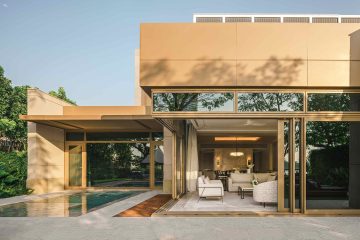 External views of a cubic villa with an outdoor pool