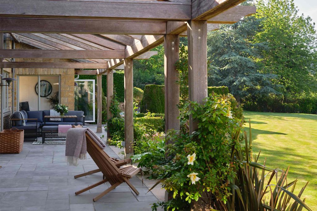 Outdoor seating with views over the countryside at Elsker, Farncombe Estate, Broadway, United Kindgom