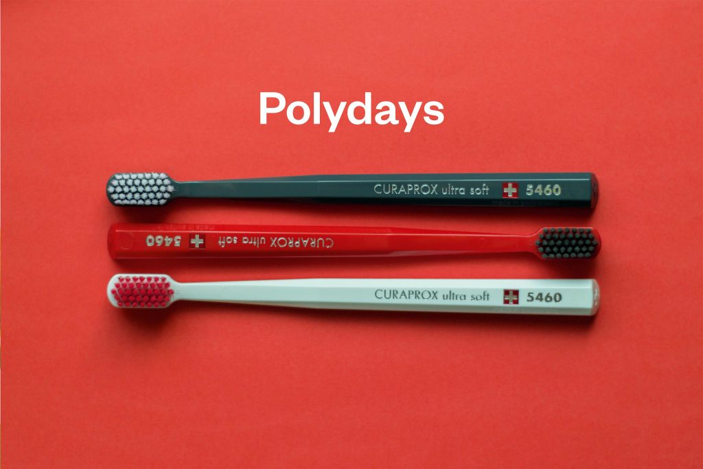 Three toothbrushes illustrate the concept of 'polydays', which sees three or more people in a relationship travel together. The Future of Queer Travel, Globetrender