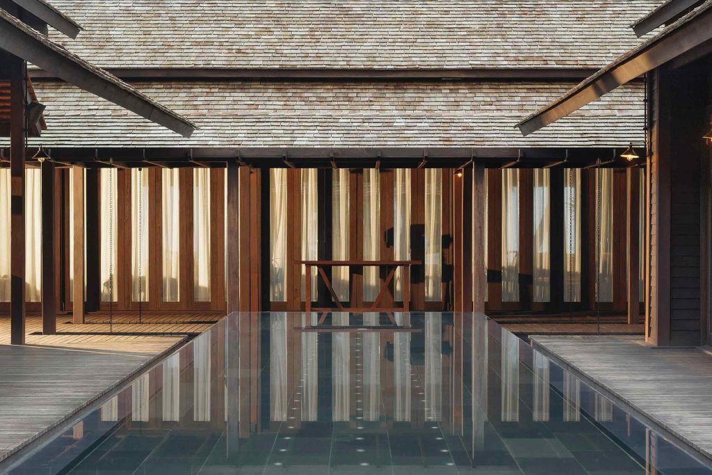 A reflective water feature at a contemporary Thai-styled restaurant
