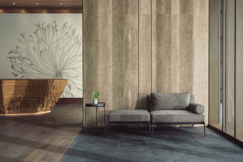 A contemporary foyer designed with earthy colours at Kimpton Maa-Lai Bangkok, Bangkok, Thailand