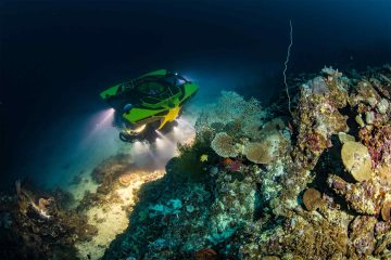 A submersible in almost pitch-black waters at one of Malta's spectacular dive sites