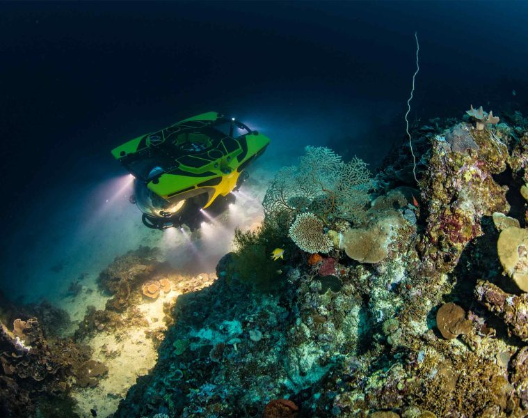 A submersible in almost pitch-black waters at one of Malta's spectacular dive sites
