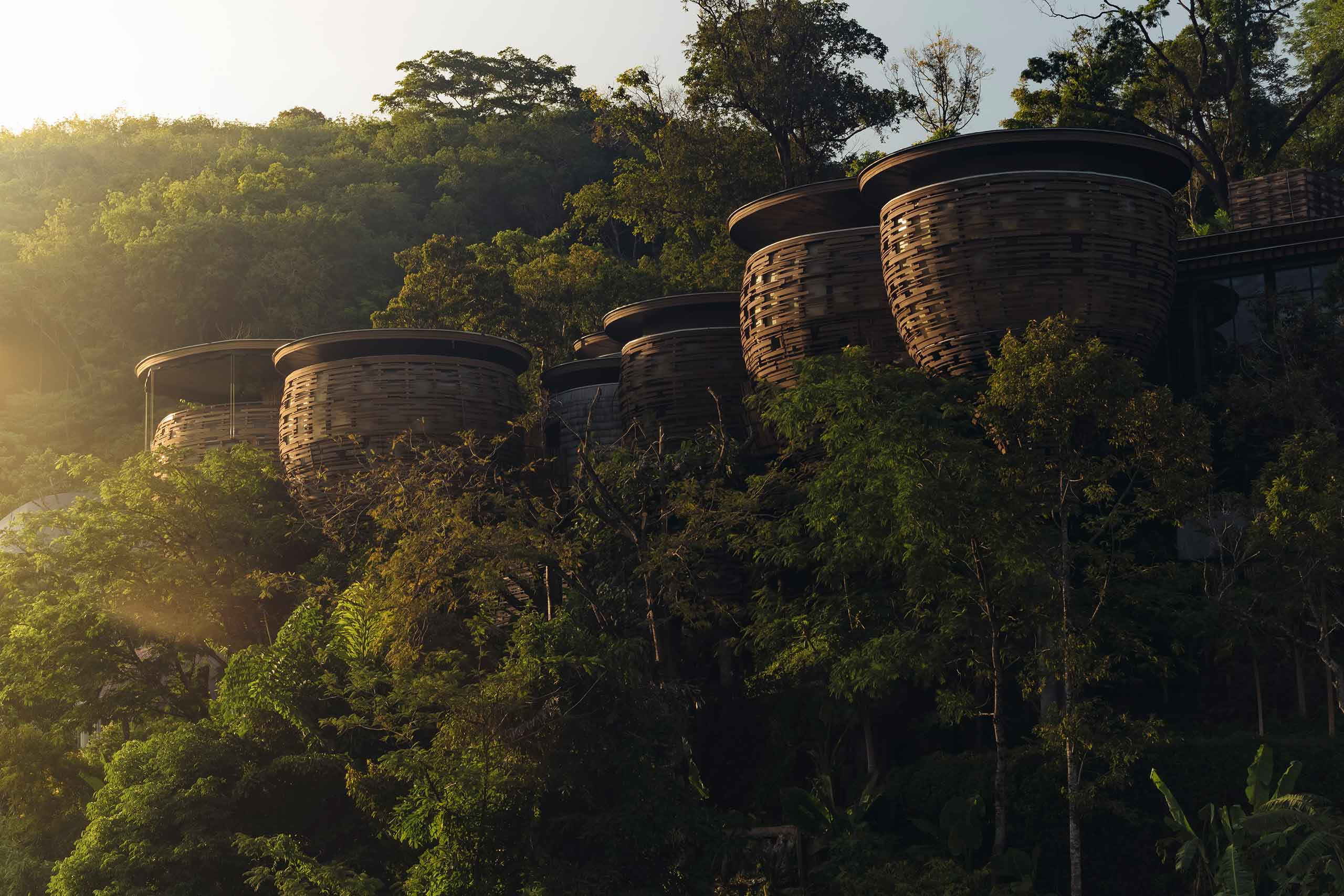Treehouses at sunrise at Keemala, a Small Luxury Hotel of the World in Phuket, Thailand