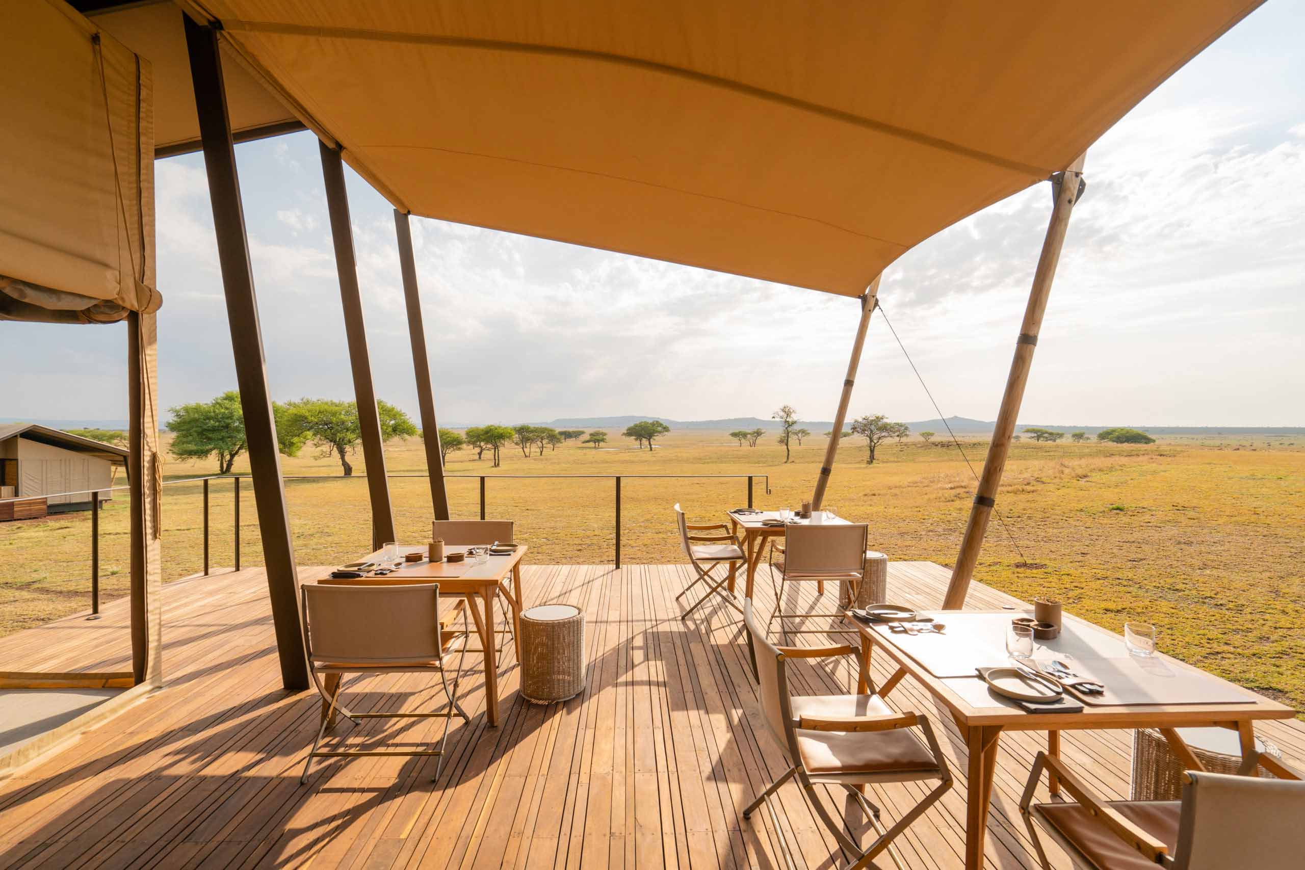 Outdoor seating area at Singita Sabora Tented Camp, Grumeti Game Reserve, Tanzania