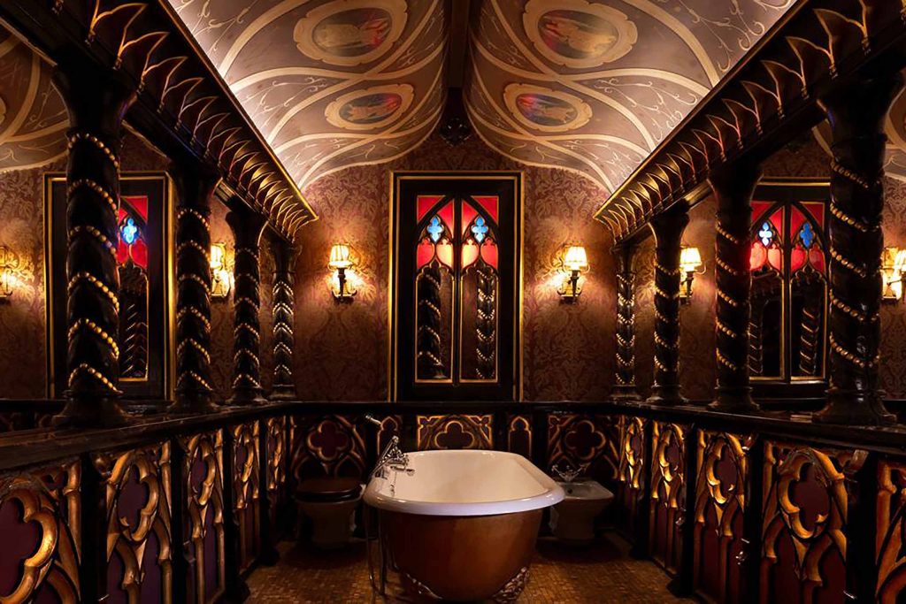 A freestanding bathtub in a traditional, romantic bathroom at The Witchery by the Castle, Edinburgh, Scotland.