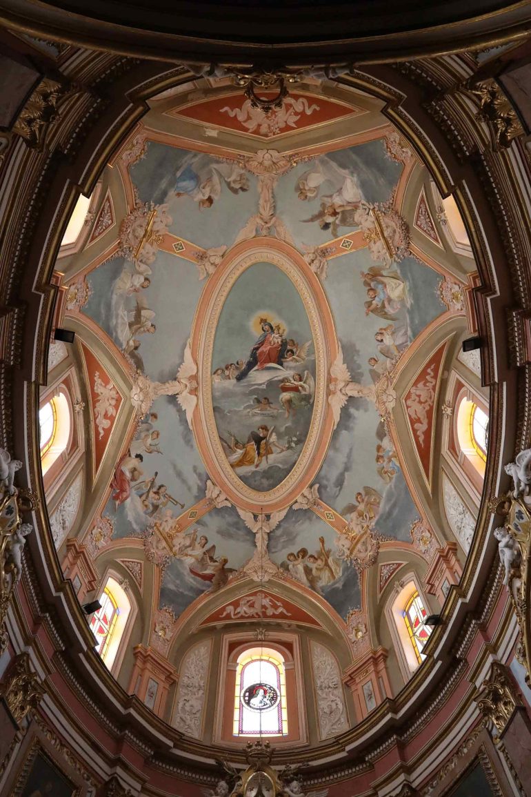 Elaborate artwork on a church ceiling in Mdina, Malta
