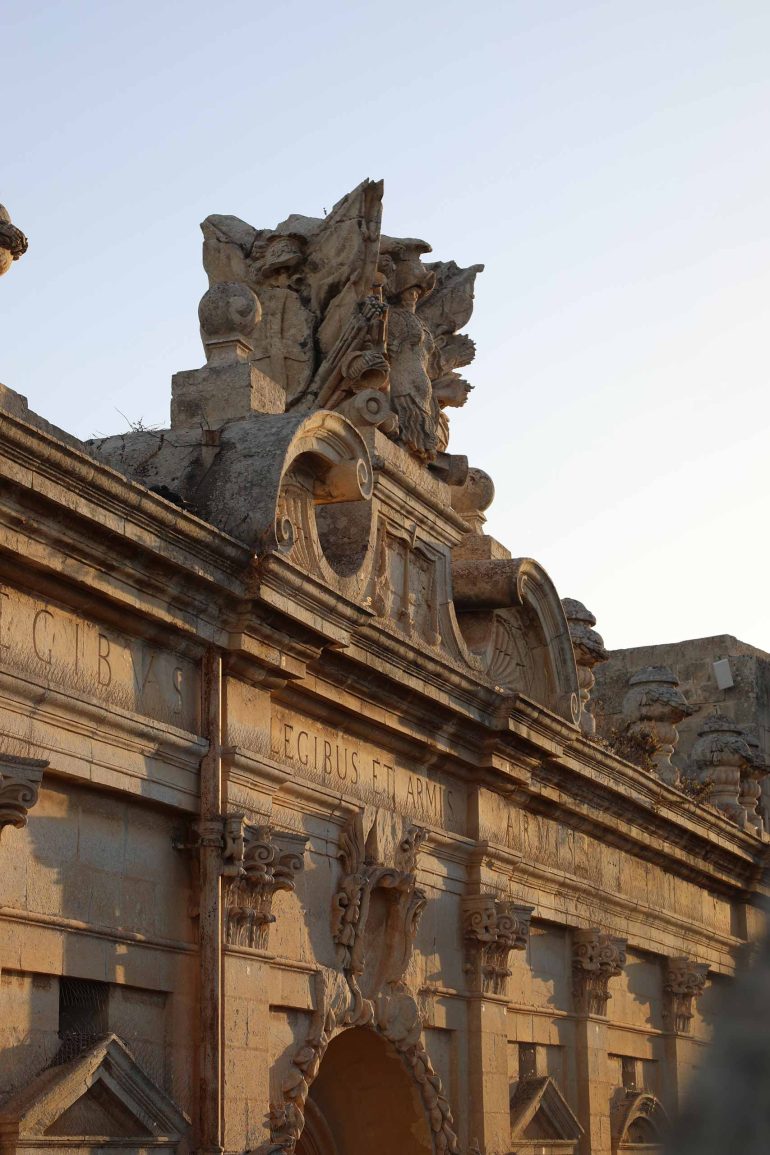Mdina's intricate architecture lit up during golden hour