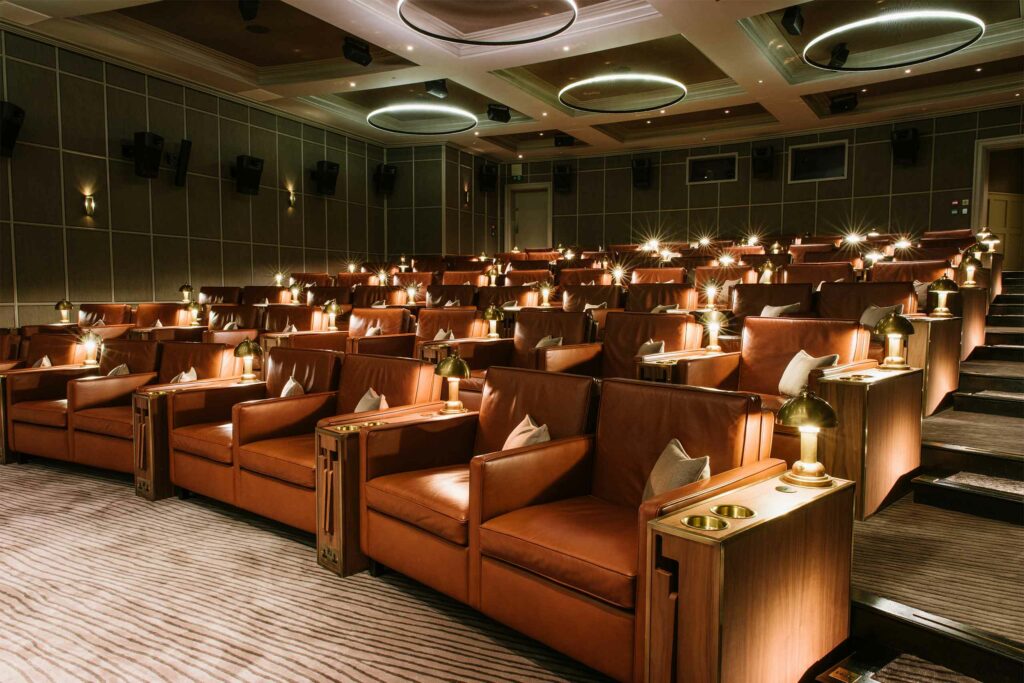 Seats inside the luxurious cinema at Heckfield Place, Hampshire, England, United Kingdom