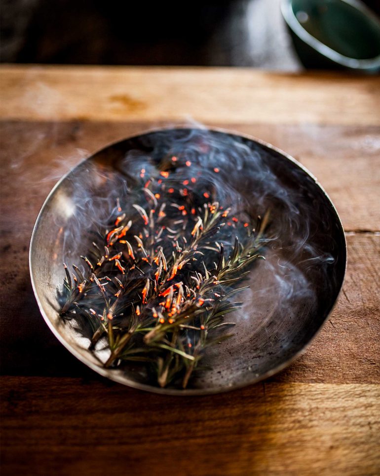 Rosemary is being flamed at VUUR Restaurant, Western Cape, South Africa