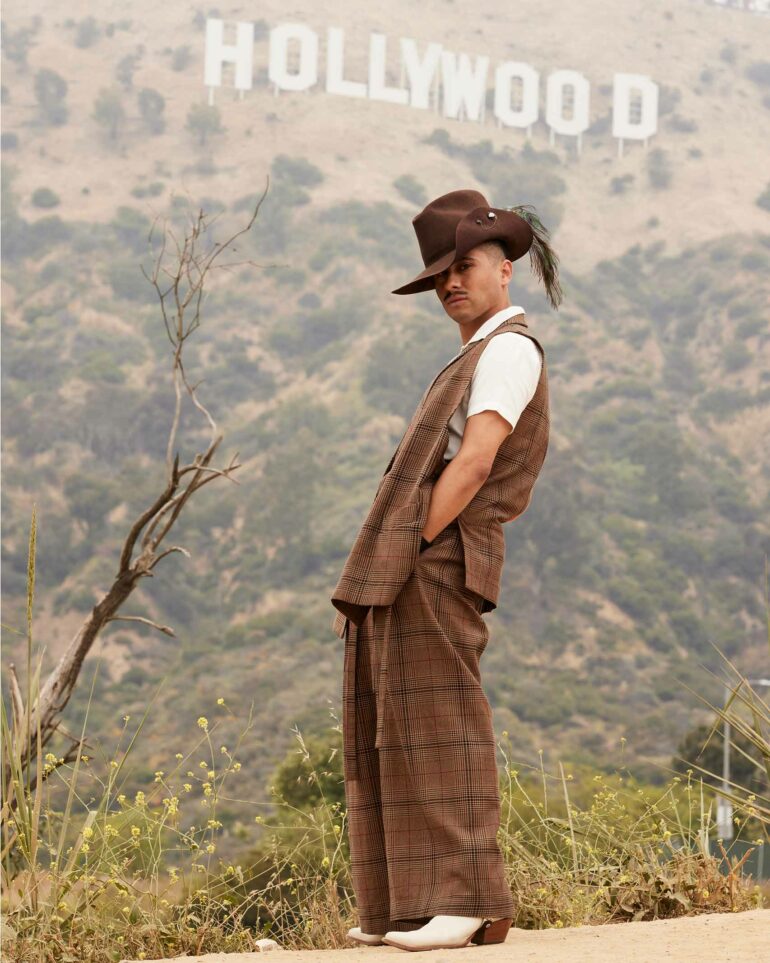 David Padilla poses in front of the Hollywood sign in California, USA
