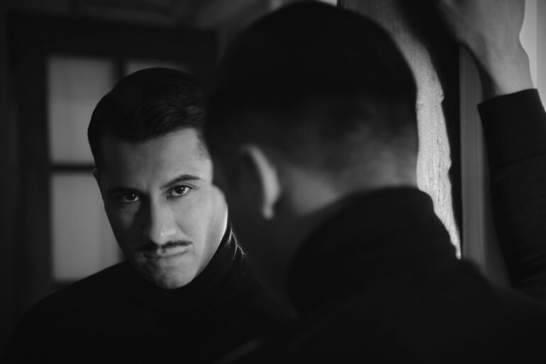 David Padilla in front of a mirror, California, USA