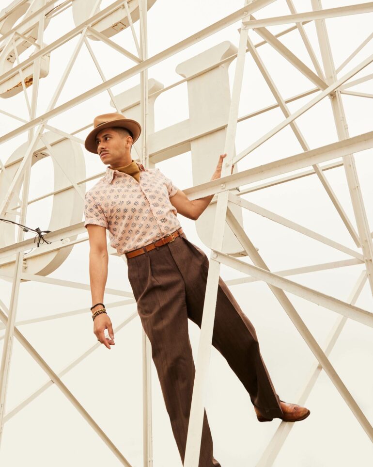 David Padilla climbs the sign at the Hollywood Roosevelt, California, USA