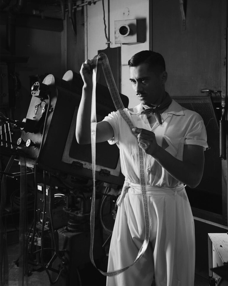 David Padilla inspects a film roll at the Los Angeles Theatre, California, USA