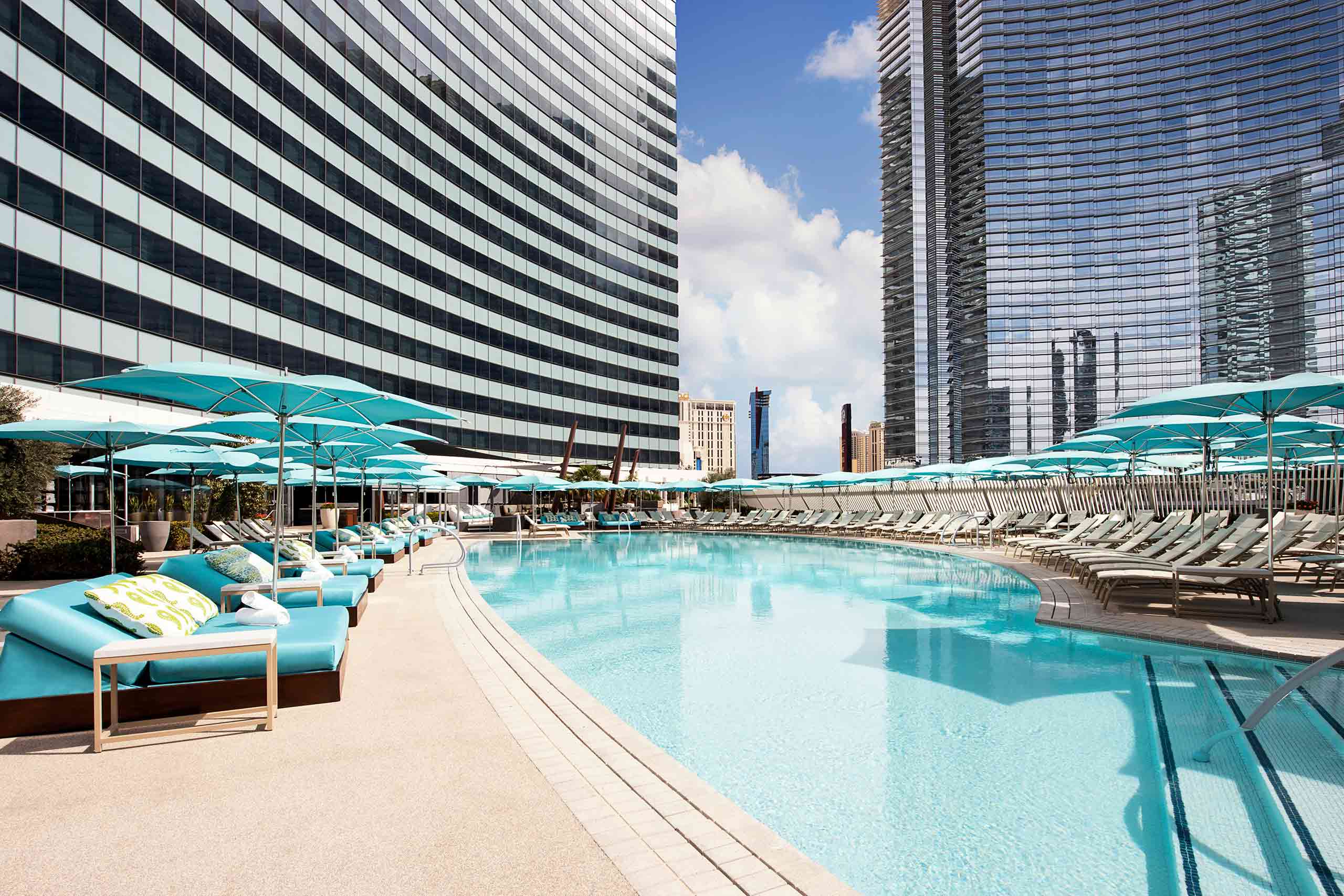 Outdoor pool with sun loungers