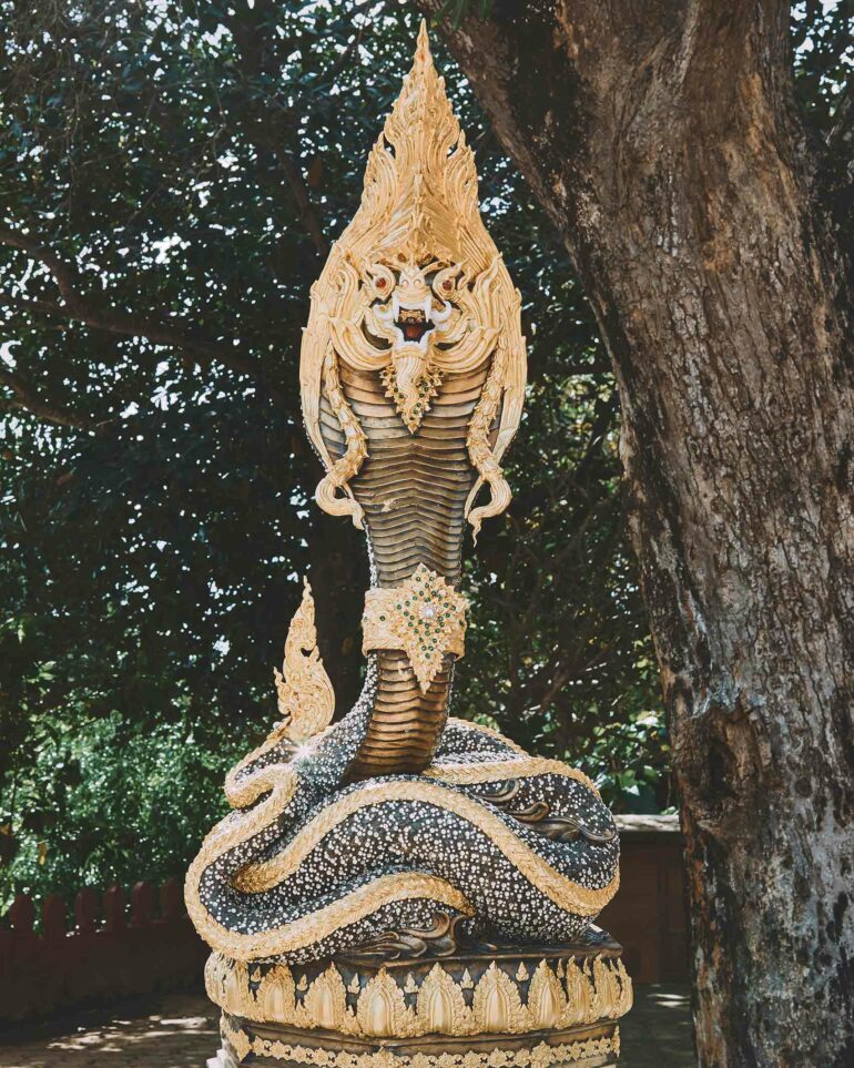 A statue at Snake Stone Temple.
