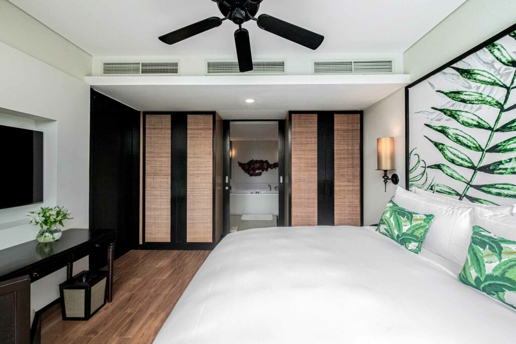 A bedroom at the Avani + Mai Khao Phuket Suites, Phuket, Thailand