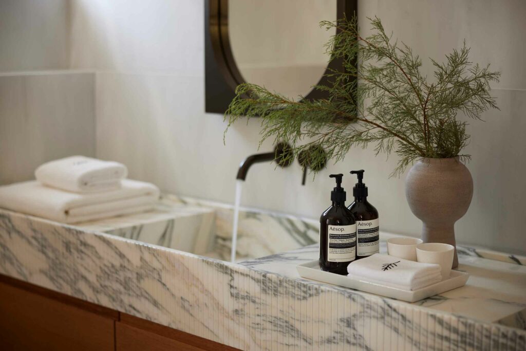 Avant Mar Paros marble bathroom and Aesop amenities