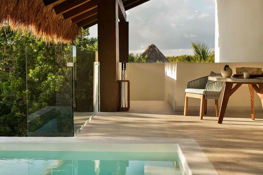 Poolside chairs at Chablé Maroma, Riviera Maya, Mexico