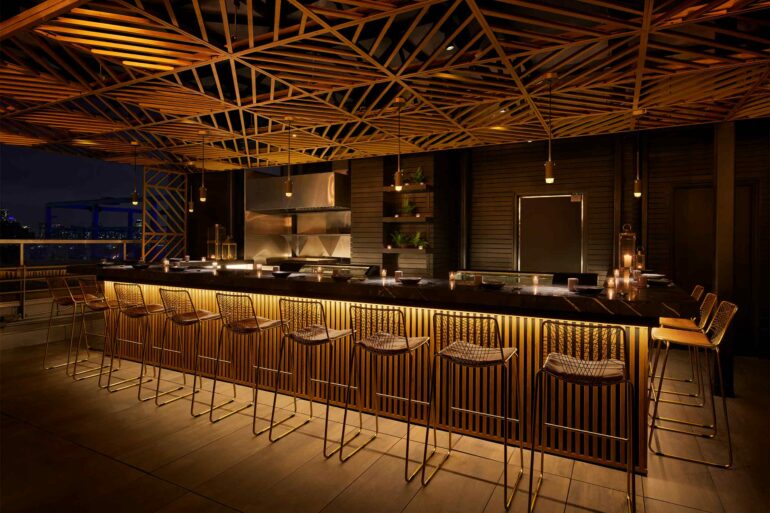 A dimly lit bar at the Gansevoort Meatpacking NYC, NYC, USA