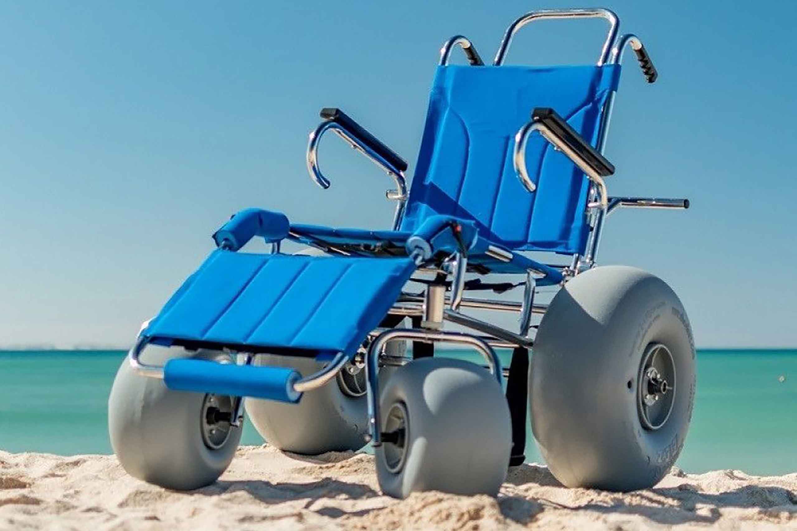 A wheelchair on a beach in San Diego.