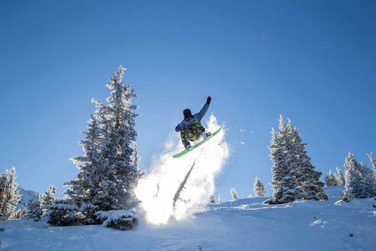 A skier leaping in the air.