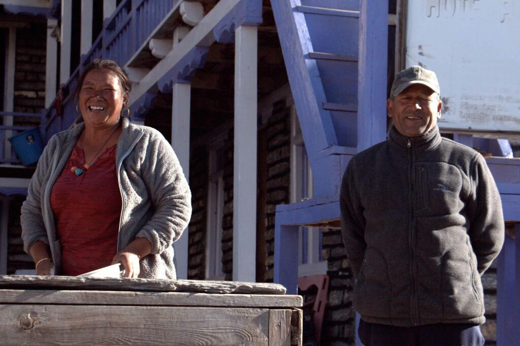 Locals pose for a photo in Nepal