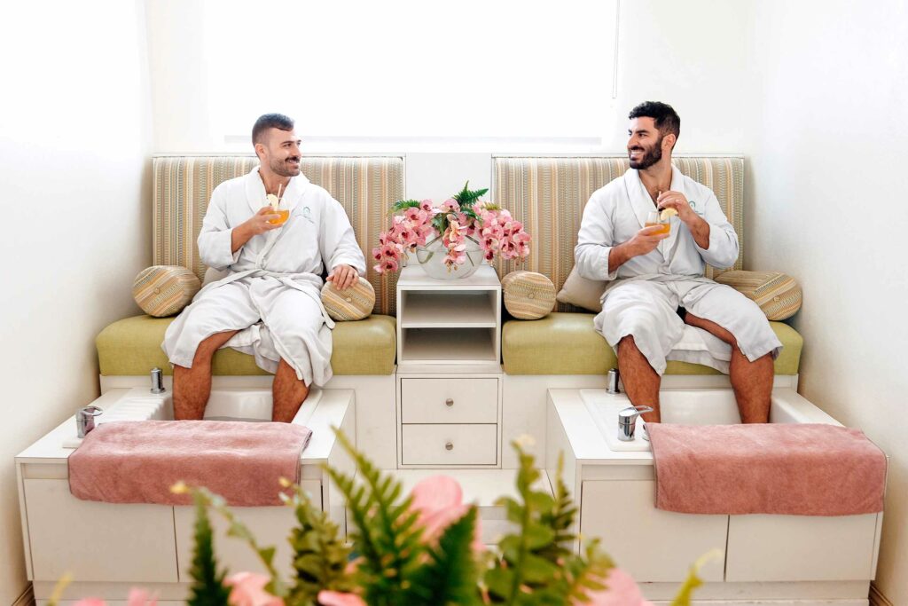 A gay couple gets treatments at a spa in Saint Lucia